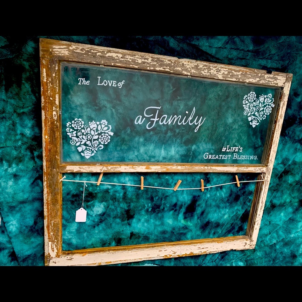 Picture hanger from vintage window